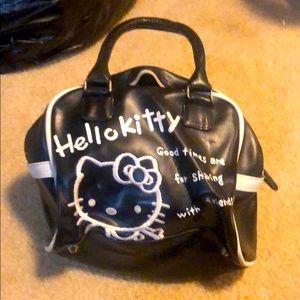 Adorable Hello Kitty bowling bag style purse.